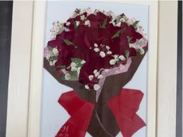 赤いバラの花束を押し花にした額装作品