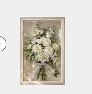 白い花のブーケを収めたウェルカムボード